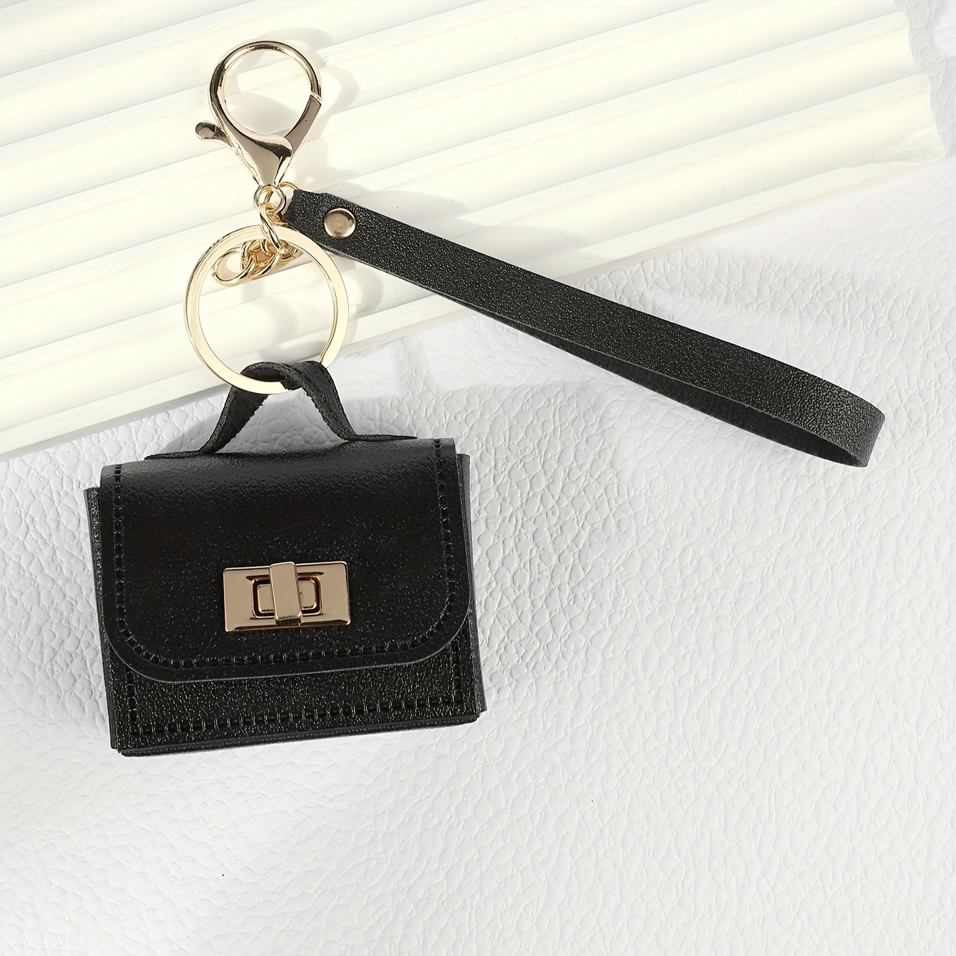 Image of 1pc Pu Leather Mini Bag Keychain With Rotating Lock , Alloy Lobster Clasp, Decorative Coin Purse & Earphone Holder Accessory For Women, Oblong Shape, No Power Required, Ideal Ramadan Gift, Small Purse