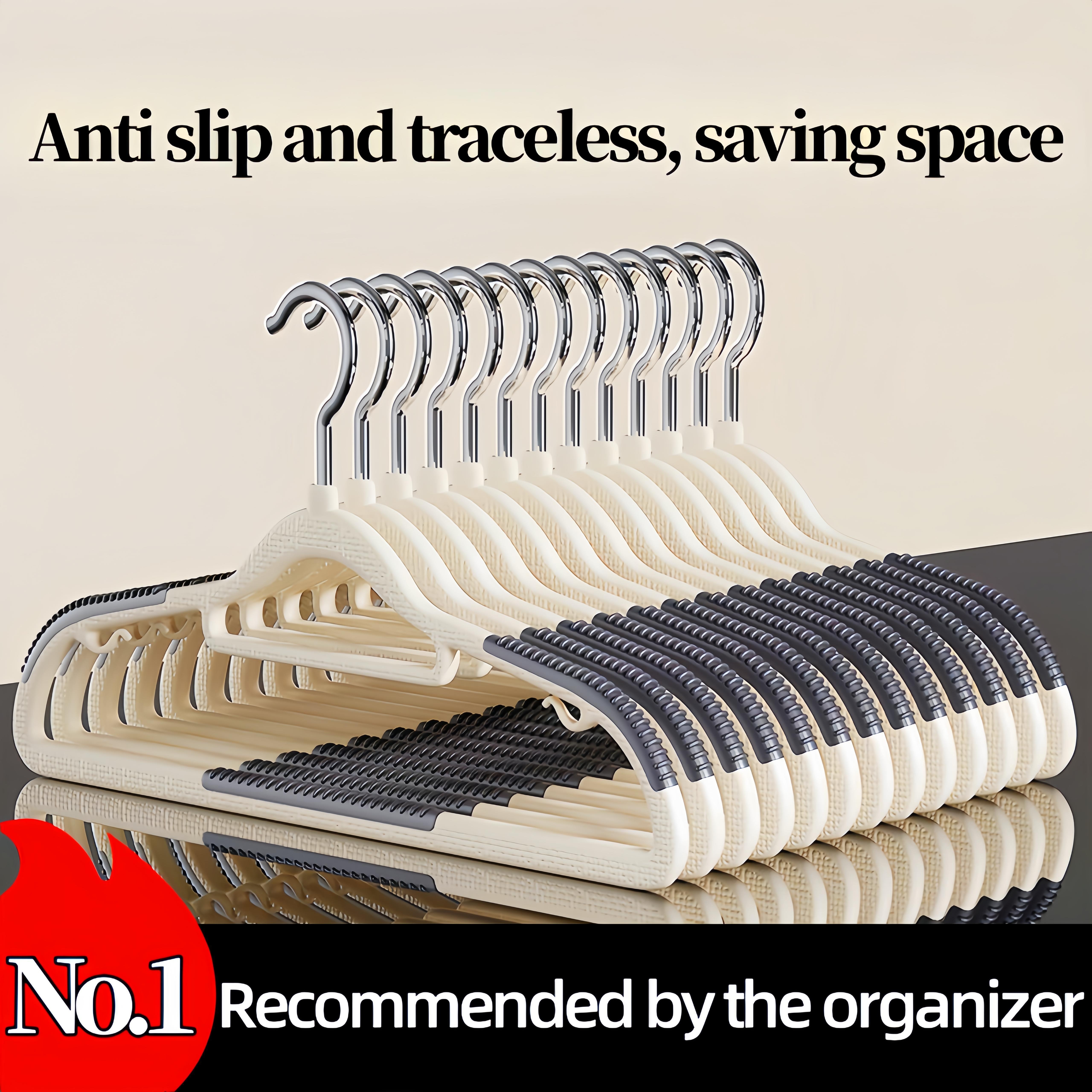 

50pcs/set Plastic Hangers, Anti-slip & Traceless Hanger, Space-saving Design With Curved Imitation Shoulder, Perfect For Home, Dorms & Rentals