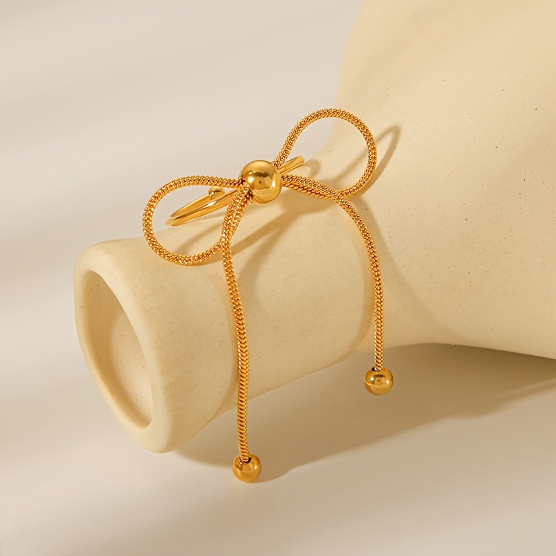Minimalist Titanium Bow Ring Bangle - Golden Tone