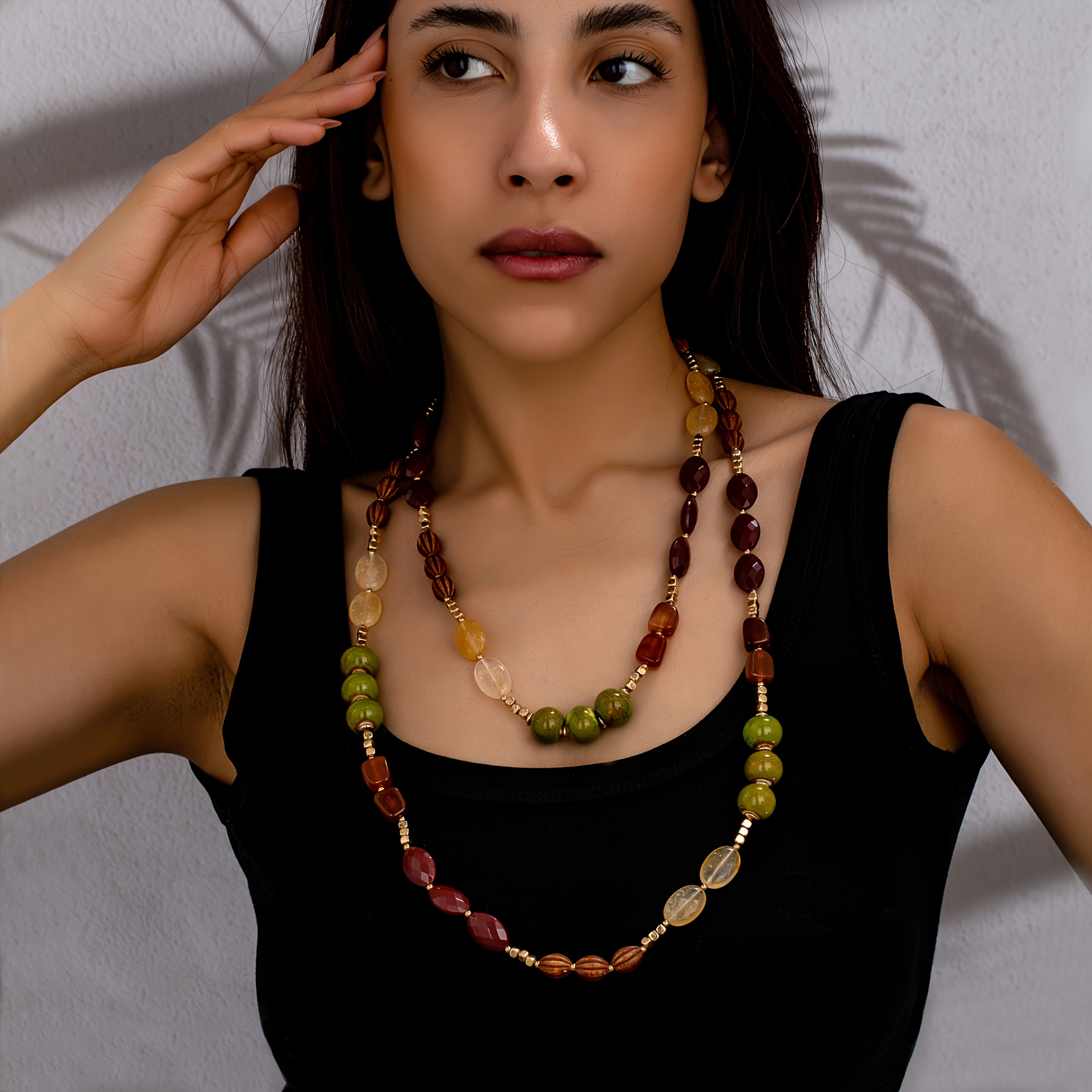 Image of A Bohemian-style Long Women's Necklace With A Creative Ethnic Flair, Featuring Of Spherical Geometric Beads In Contrasting Colors