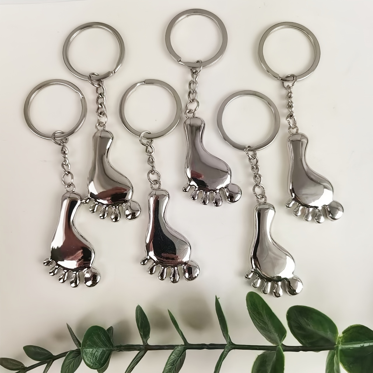 Image of 6pcs Set, New Korean And Japanese Popular Couple Clothing Additions, Simulation Mini Little Foot Key Chain, Street Student Daily Wear Personalized Style Unisex Car Key Bag Additions Alloy Foot Pendant
