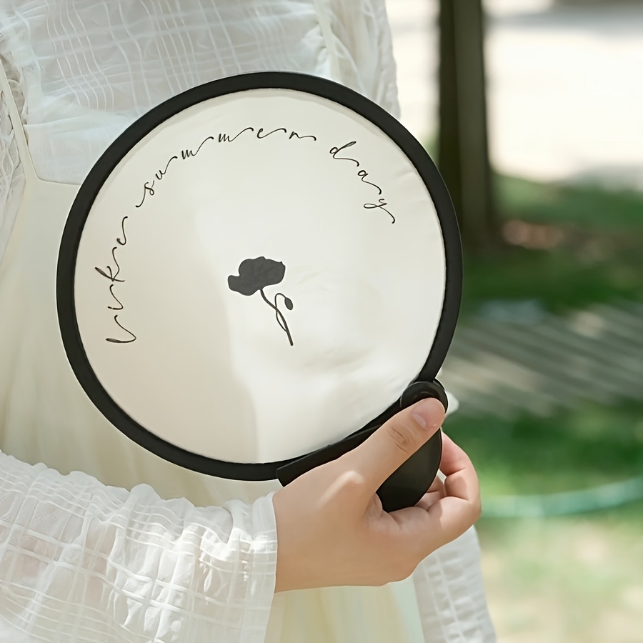 round folding fan sold on Temu United States