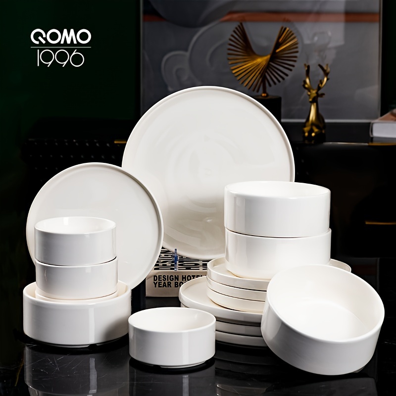 

A White Luxury Dinnerware Set, Featuring Of 16/24 Bowls And Plates From The Standing Series.