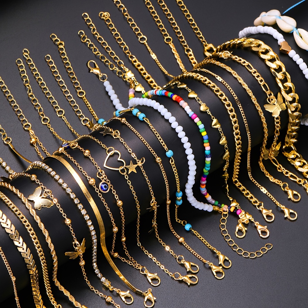 Conjunto de 22 piezas de joyería de moda - Diseño elegante y simple vintage con cuentas de colores, mariposa, ojo malvado, concha, cruz, corazón, estrella, avión, hueso de serpiente, cadena trenzada, diamantes de imitación y cadenas simples minimalistas - Pulseras y tobilleras de aleación de zinc para uso diario, regalos y fiestas navideñas