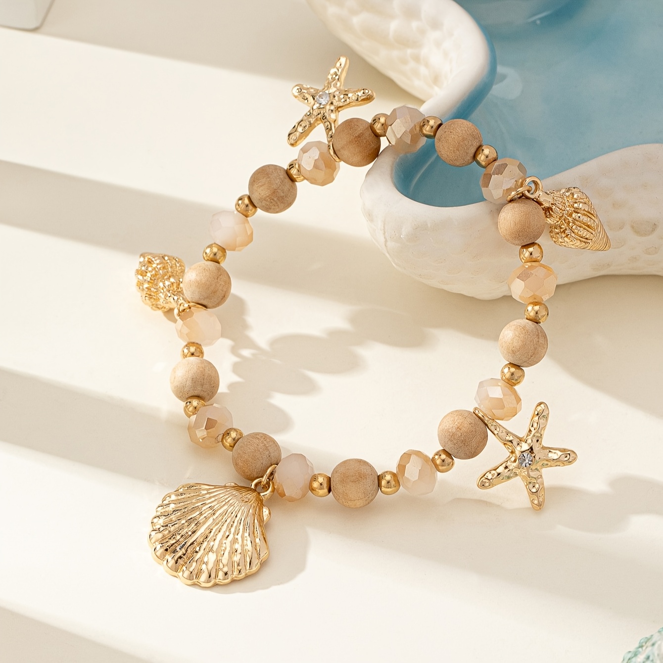E-shop Ein bohemischer Strandurlaub-Stil Seestern Muschel Schnecke Handgefertigter Rosenkranz Sommer Design Modisches Vielseitiges Damenarmband