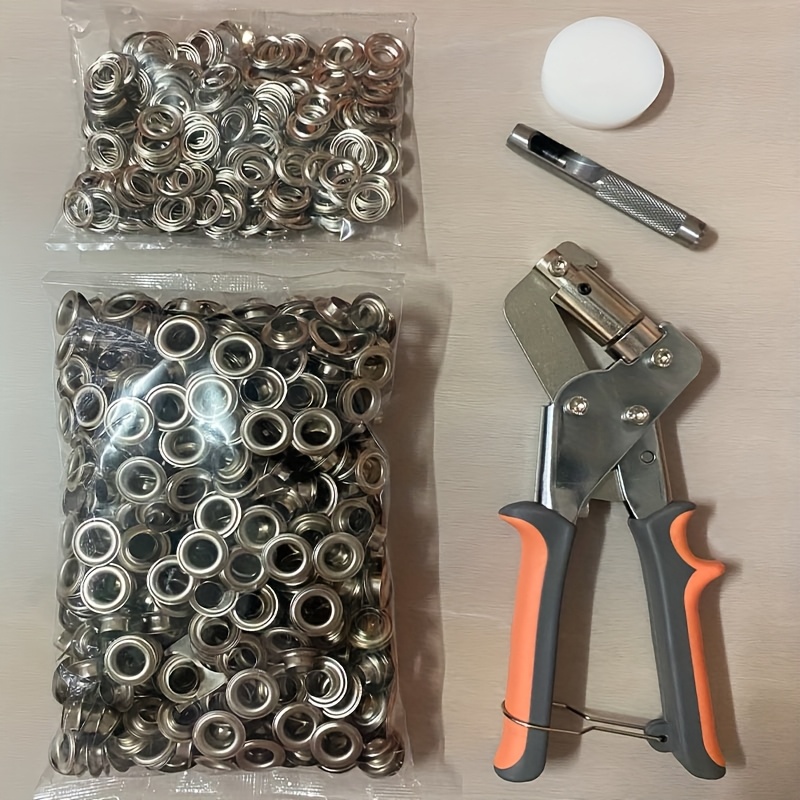 500pcs heavy duty grommet tool kit with handheld press hole punch carbon steel construction 3 8 10mm eyelets for leather canvas fabric vinyl tarps banners tents heavy duty press with ergonomic handle storage case ideal for diy construction camping marine automotive industrial use durable precise grommet setting system Product details 1