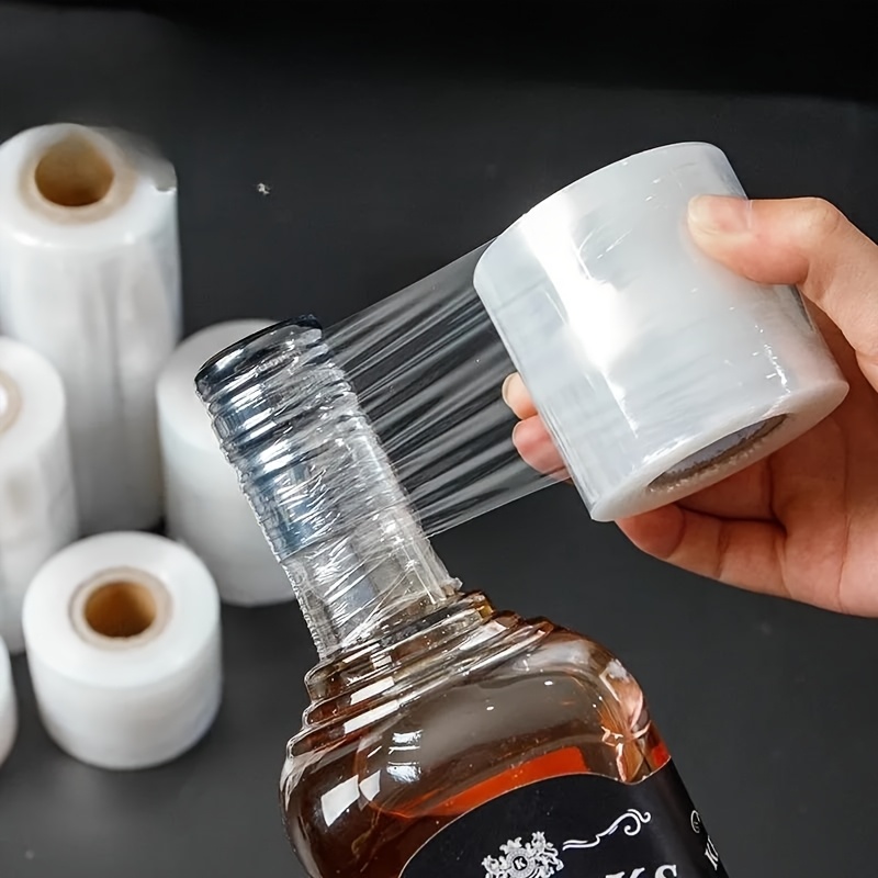 1 roll of 9055 inch stretchable shrink film non heated bottle sealing machine   for bottled packaging supplies suitable for bottles jars and can sealing film Product details 0