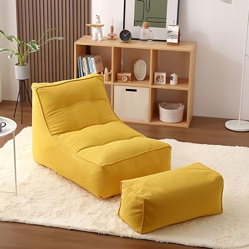 A Comfortable Sofa That Can Be Adjusted for Reclining Or Sleeping, a Single-Person Lounge Chair, a Small Tatami Bed for Humans Resembling a Dog Bed, And a Bean Bag Lounge Chair