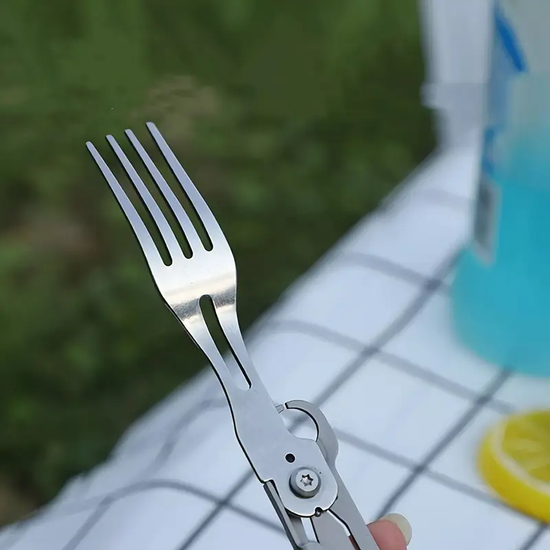 a versatile folding outdoor tableware set with 5 in 1 including knife bottle opener made of stainless steel easy to clean and with a storage bag camping details 4
