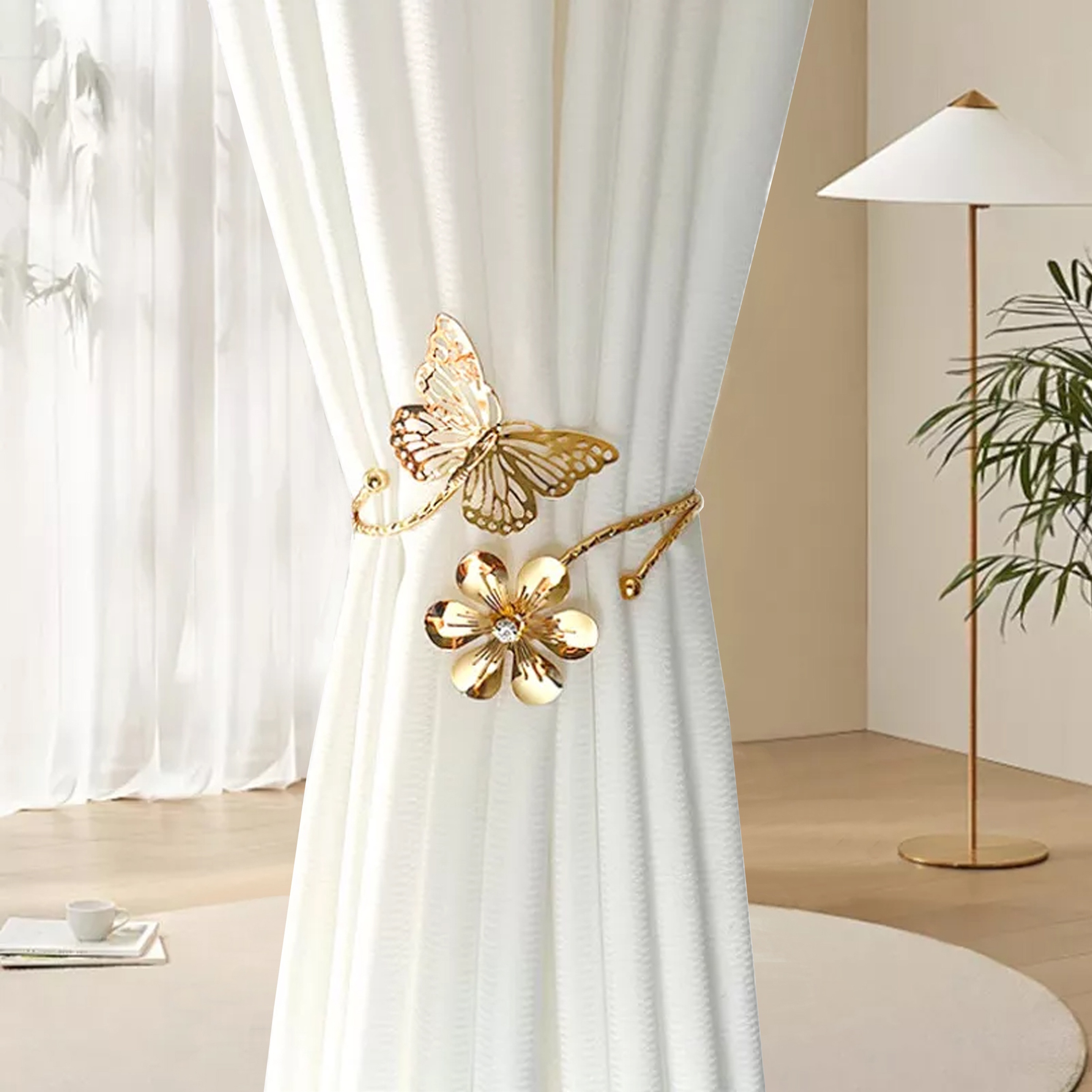 two golden silvery butterfly and flower shaped curtain tiebacks featuring a modern minimalist style with creative hollow     adjustable curtain holders     without drilling suitable for living room bedroom office home decor   a warm feeling to your home details 4