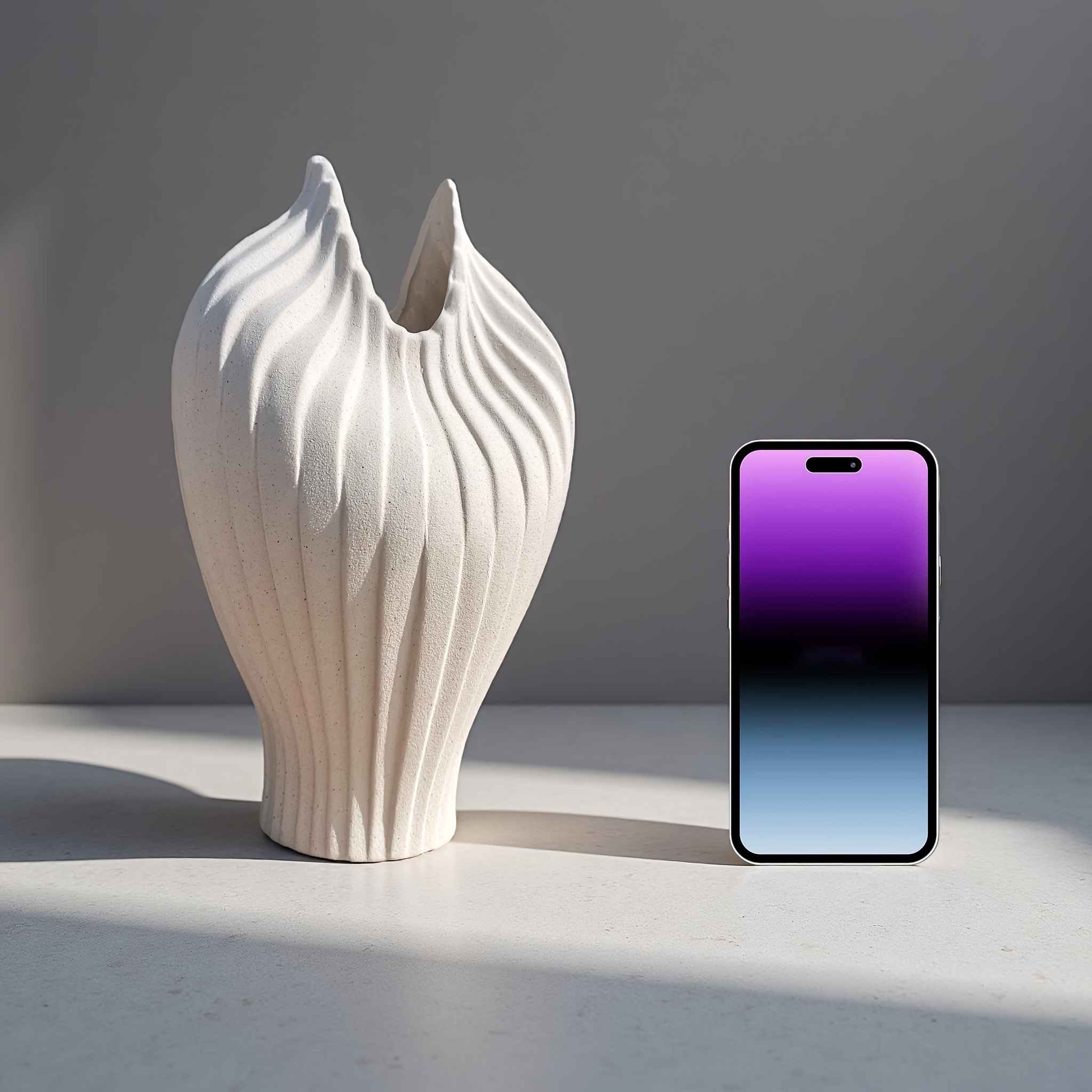 A Handcrafted Decorative Ceramic Vase with an Artistic Design Style, Featuring a Masterfully Designed Shape and Frosted Texture. Suitable for Decoration in Various Settings
