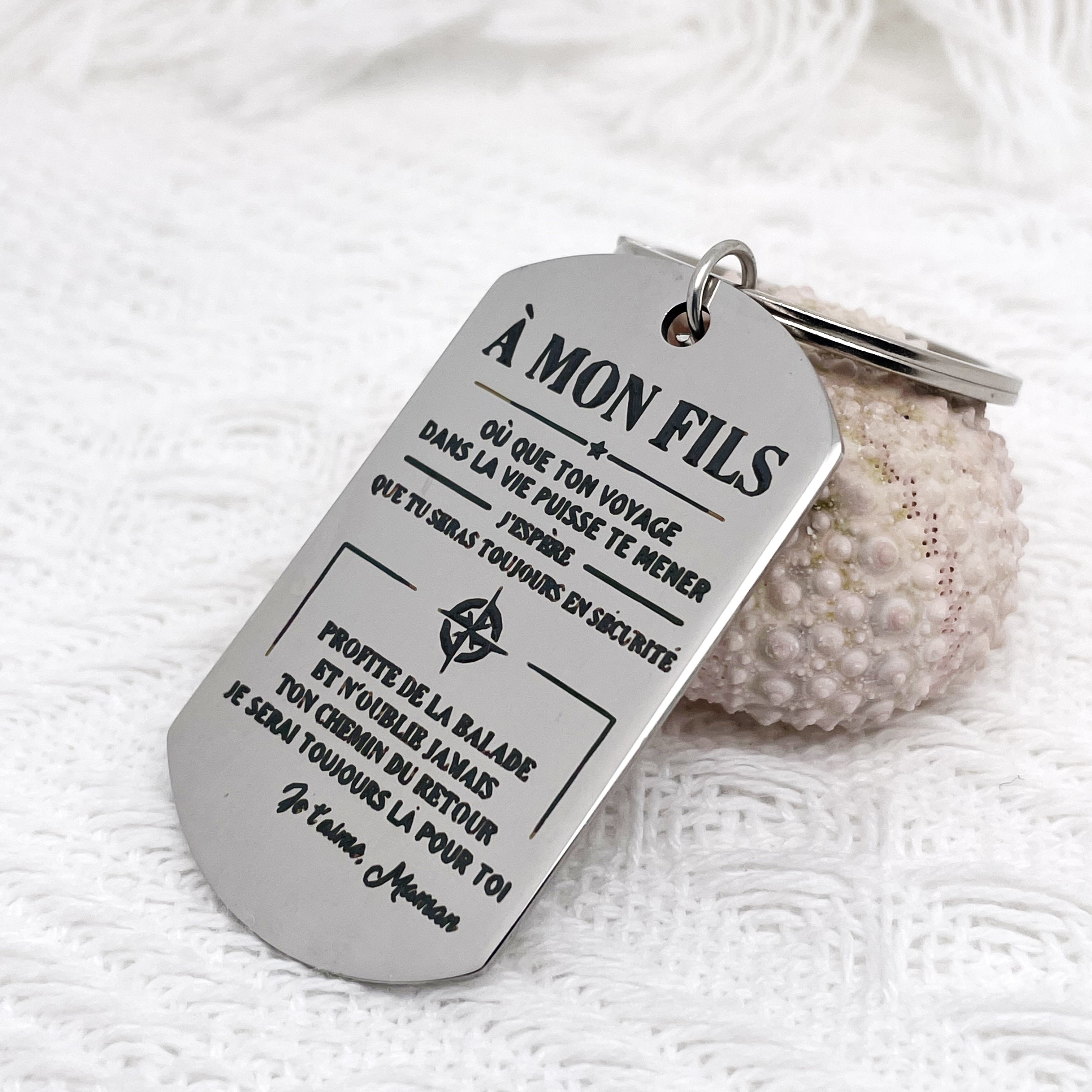 

A Keyhole Gift From Mother To Son, In French, Mother Is By Your Side.