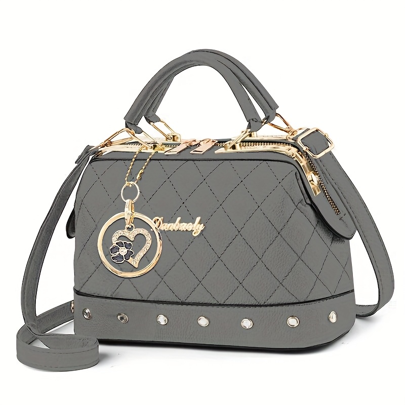 Black Quilted Boston Bag with Golden