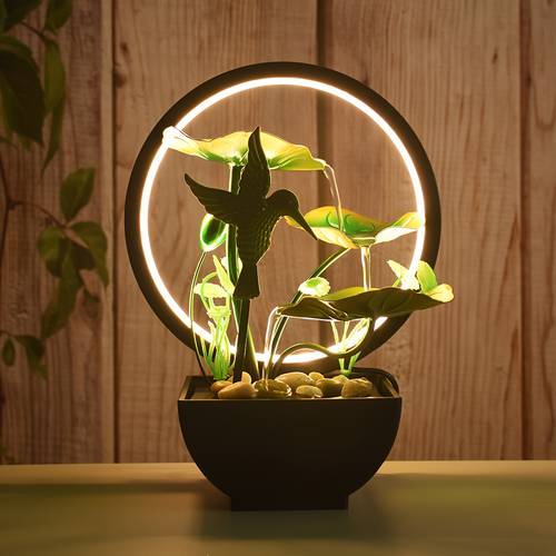 item picture a usb powered decorative fountain for home and office use this portable desktop waterfall kit is designed to provide a calming and relaxing atmosphere zen meditation it features natural stones and serves as a room decoration