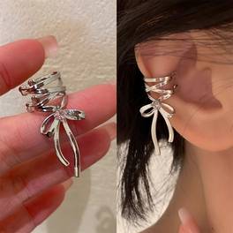 1 pair of fashionable and elegant ballet style hollow out ribbon clip on earrings niche trendy and versatile daily commuting ear accessories for men and women