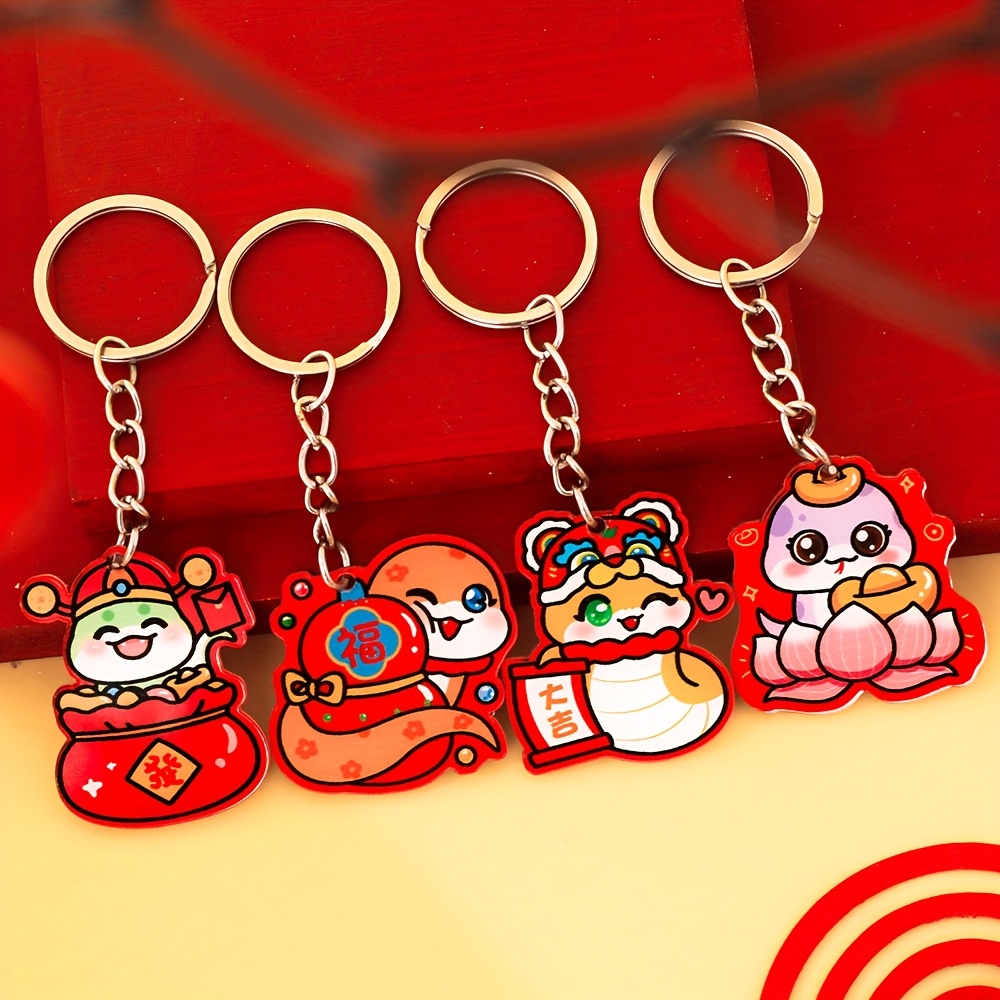 

4pcs/set 2025 Snake Year Resin Keychain, Cartoon Anime Animal Theme, Round Beaded Key Rings With Ring , Good Luck Charms, Decorative Ladies Key Ring For Bags, Ideal New Year Gift