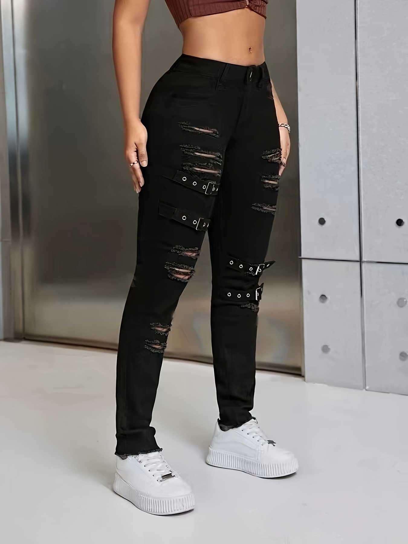 Pantalones negros rotos mujer sale