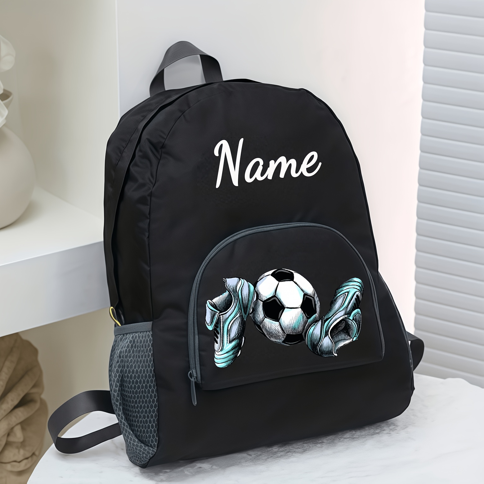 TEMU A Backpack That Customized With Names, Numbers, Text, Etc. It In Multiple Colors, Has A Large Capacity And Is Foldable. It Has Football And