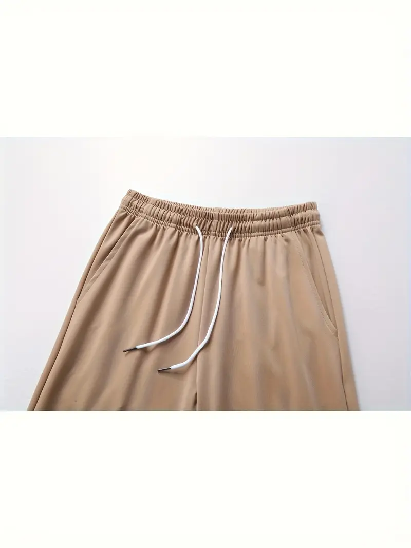 pantalon taille haute pour femme avec ceinture à cordon, tissu élastique, poches latérales et design froncé pour le camping et le port - noir, extérieur | pantalon à ceinture froncée | pantalon en tissu extensible Détails du produit 7
