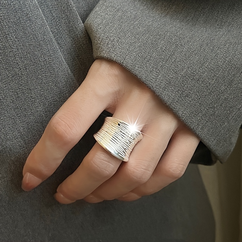 Image of A Versatile, Fashionable Wide-band Women's Ring With Brushed Lines And An Adjustable . An Ideal Gift For . Suitable For Daily Commutes, Parties, Vacations, And Music Festivals