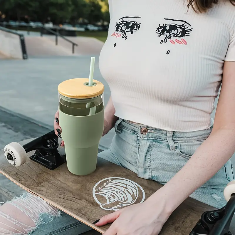 32oz glass with lid and straw silicone non slip sleeve heat in cold out suitable for iced tea beverages juices coffee lead free bpa free Product details 1