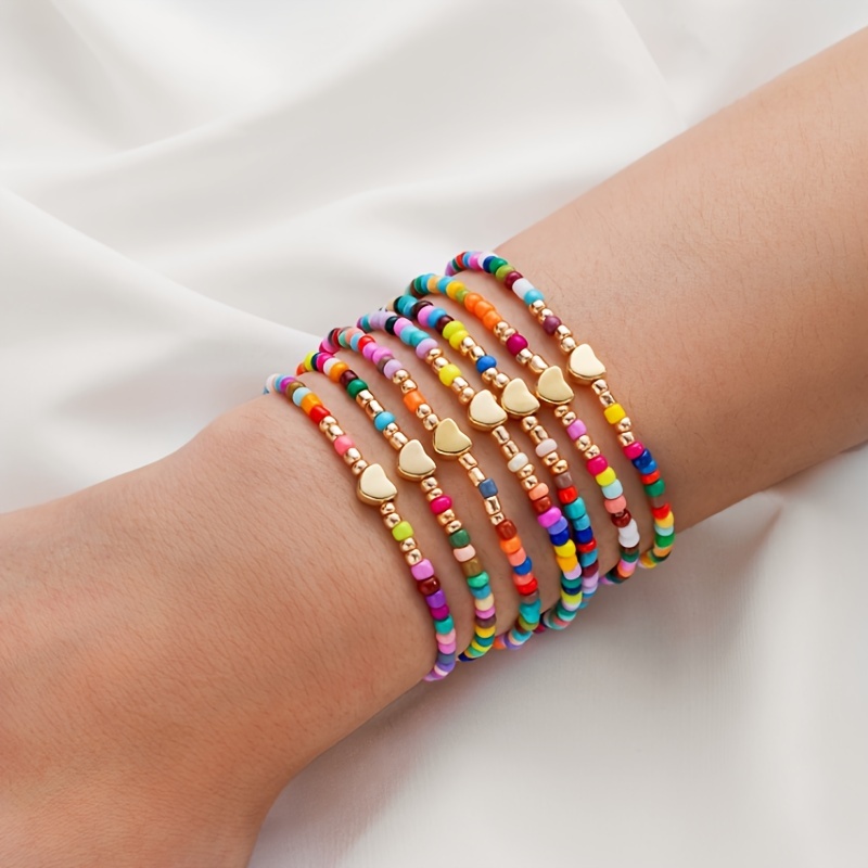 

7 bracelets colorés avec des breloques en de cœur - Parfaits pour un et pour offrir - Convient à toutes les