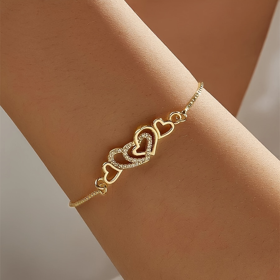 

Vintage Style Gold-tone Bracelet With Dazzling Heart Charms - Perfect For Everyday Wear And Parties