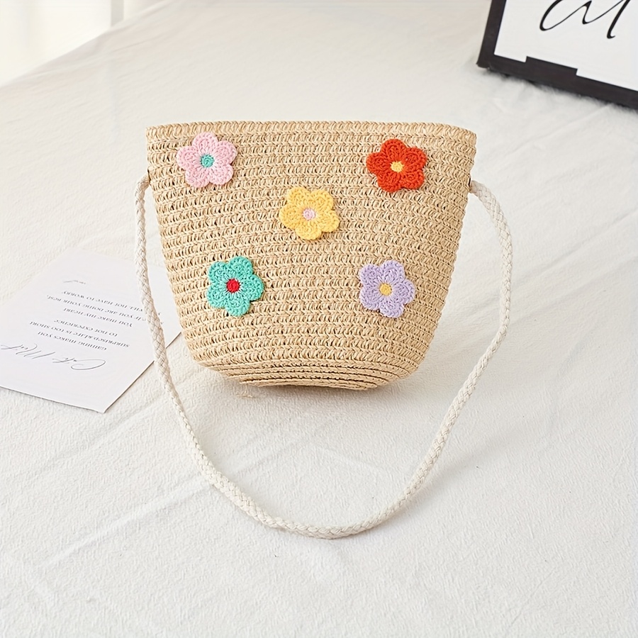 Image of A Colorful Small Flower Decorated Crossbody Bag, Compact Size Suitable For , Keys, And Other Small Items. It Features An Adjustable Shoulder Strap And Is Lightweight