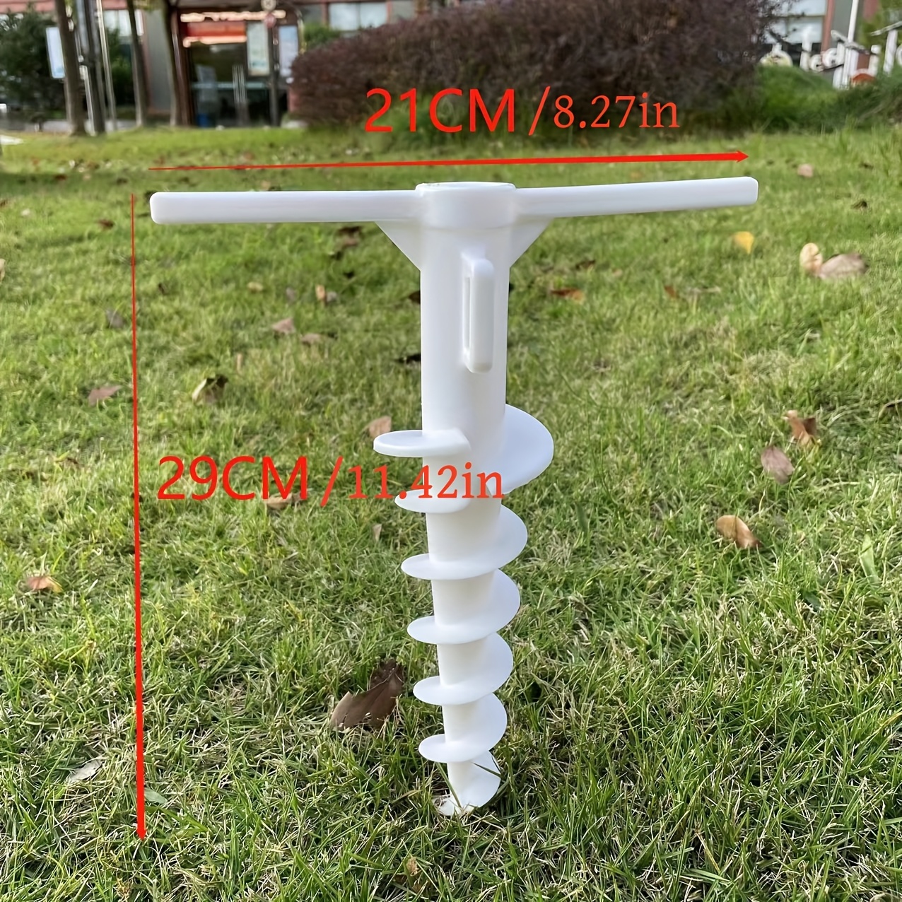 Image of A Ground Tube For Beach Umbrellas Made Of Plastic, With A Diameter Of 22mm, Designed As A Spiral T-shaped Anchor For Tents