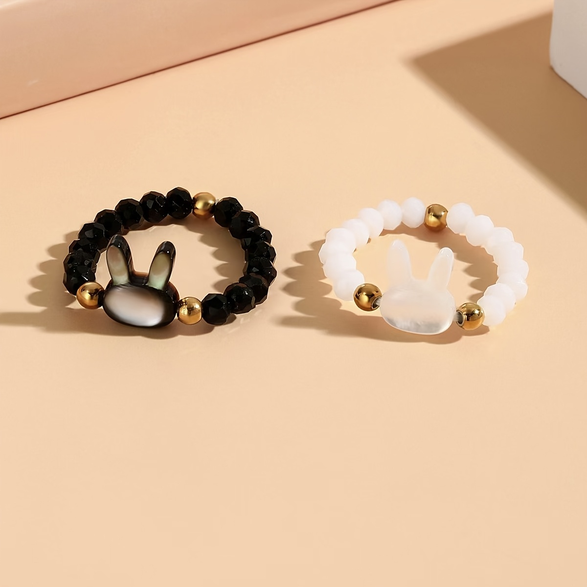 Beaded Stretch Ring with Rabbit Charm Golden Accents