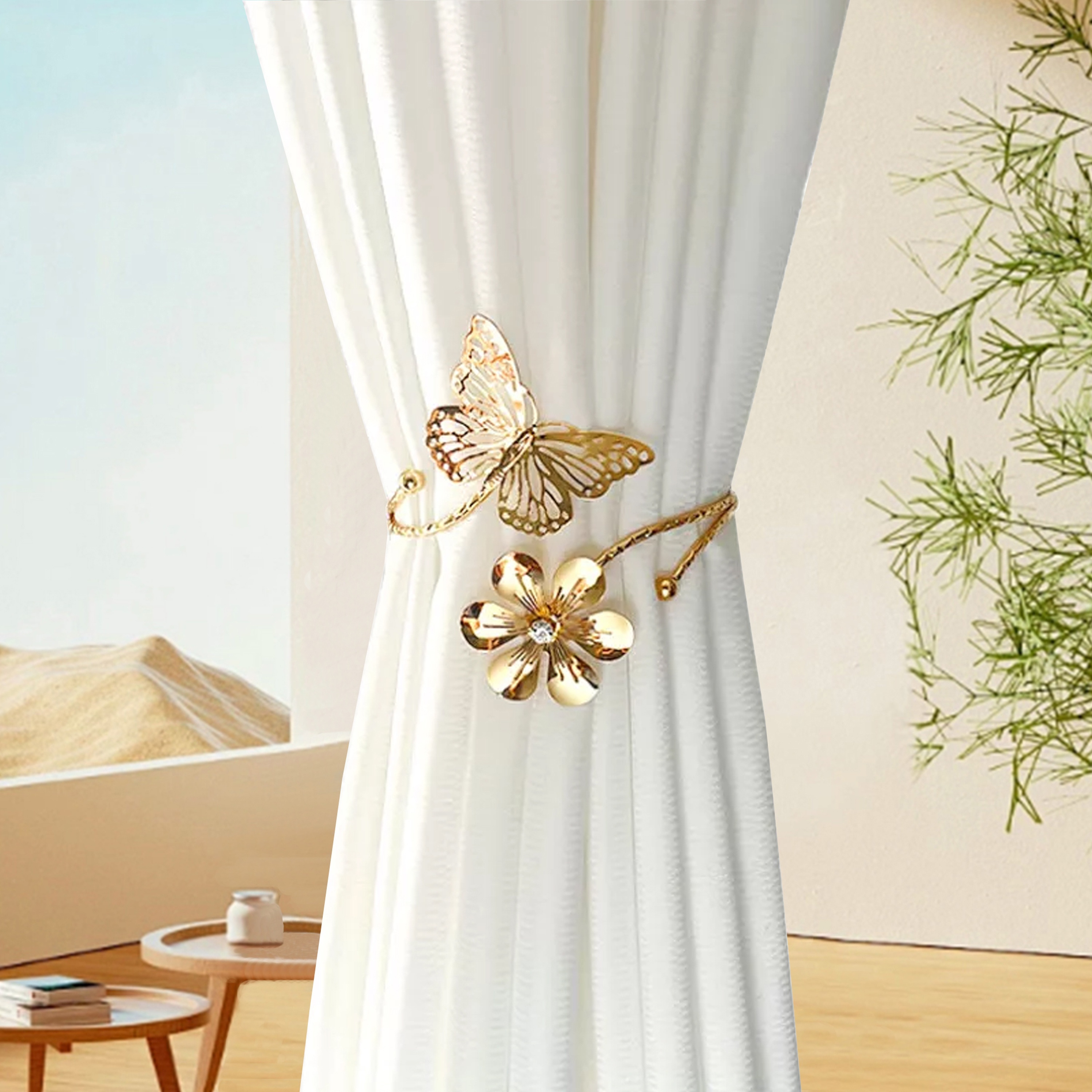 two golden silvery butterfly and flower shaped curtain tiebacks featuring a modern minimalist style with creative hollow     adjustable curtain holders     without drilling suitable for living room bedroom office home decor   a warm feeling to your home details 3