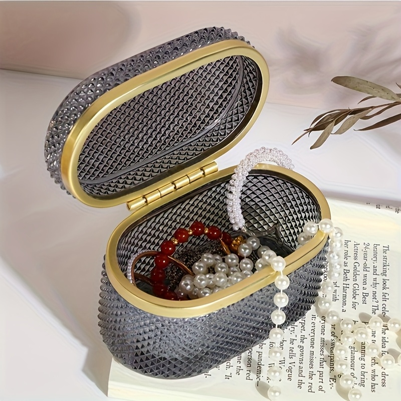 modern clear glass storage box with golden accent lid dustproof oval desktop organizer for jewelry makeup pads and accessories polished   multi purpose   metal interior no power needed makeup storage contemporary style textured glass jewelry boxes Product details 3