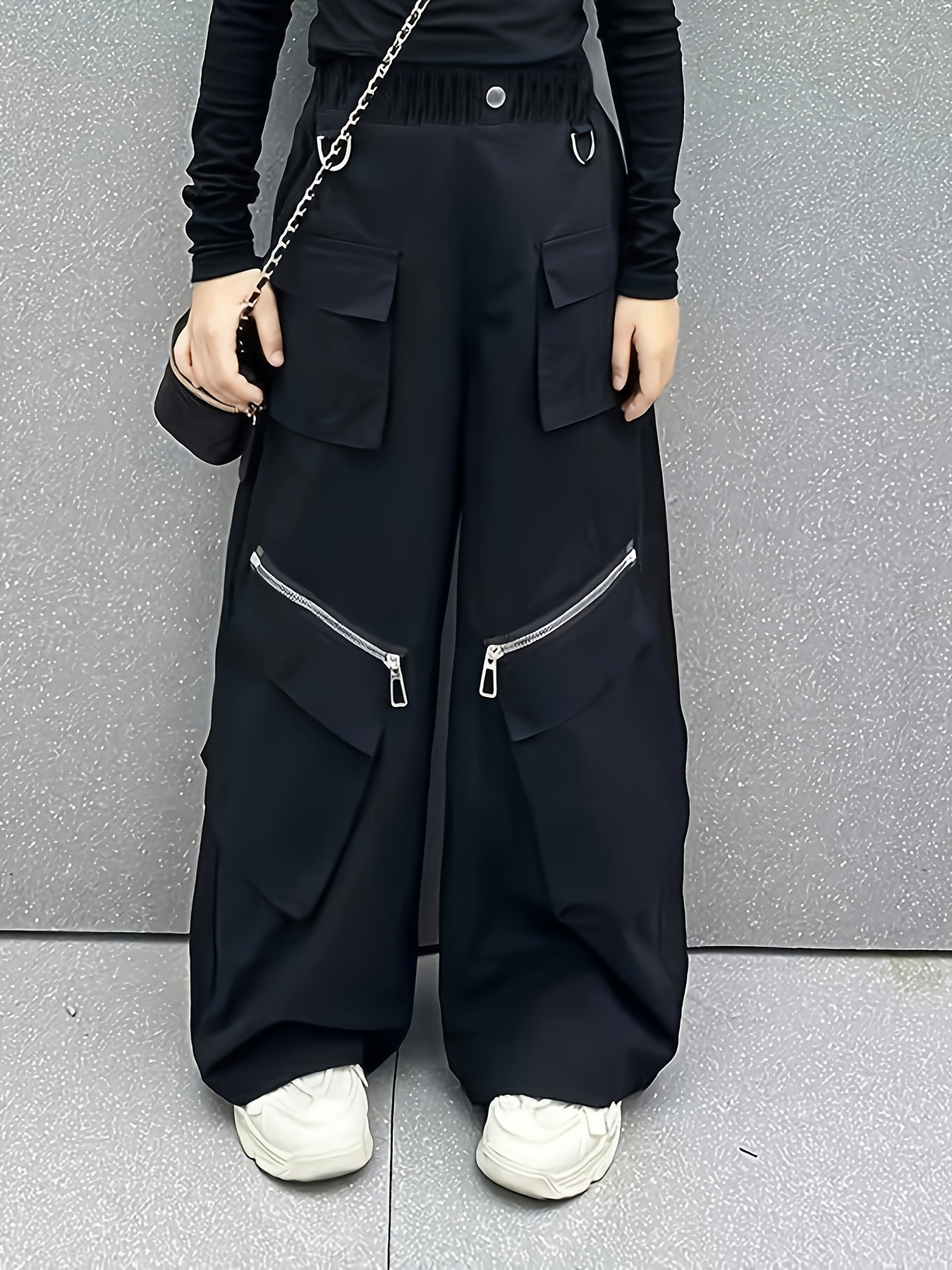 item picture y2k girl   fashionable cargo pants featuring zippers and large pockets on the sides loose fitting casual long pants with multiple pockets elastic waistband suitable for outdoor activities   and autumn