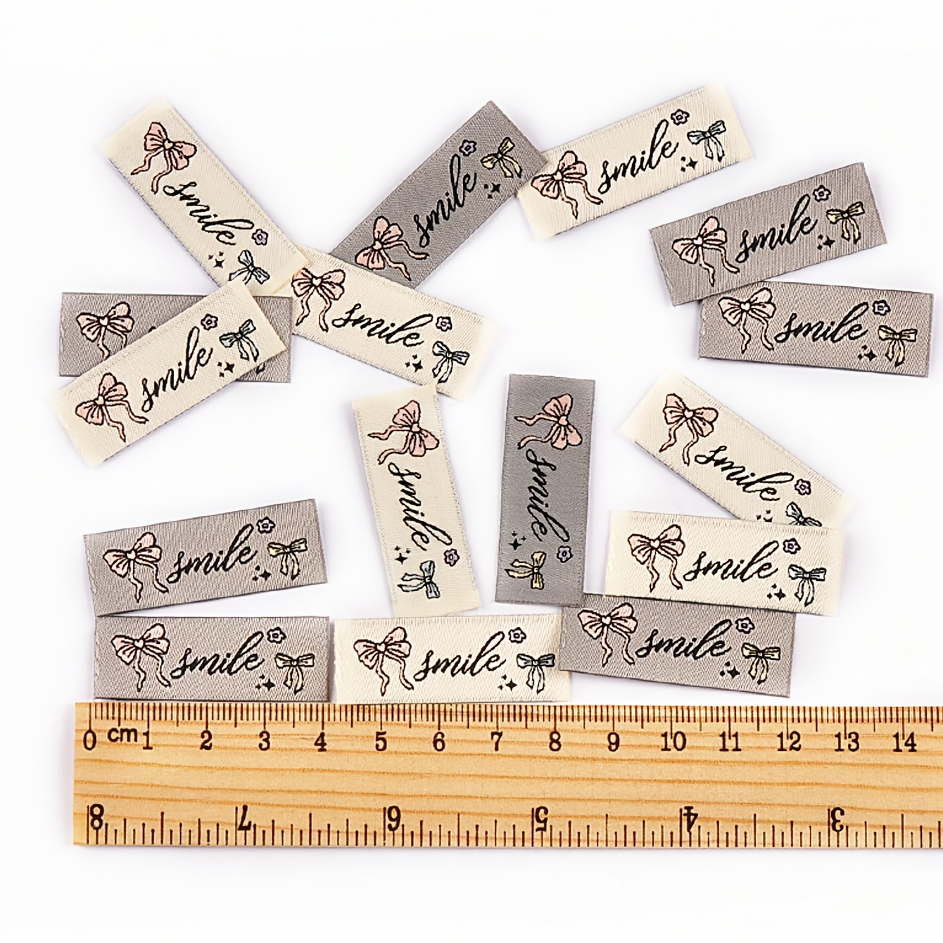 Image of 50pcs 4.1x1.5cm Mixed 2 Colors Bow Pattern Rectangular Tags For Handmade Doll Clothing And Hat Bag Packaging Decoration Personalized Sewing Additions