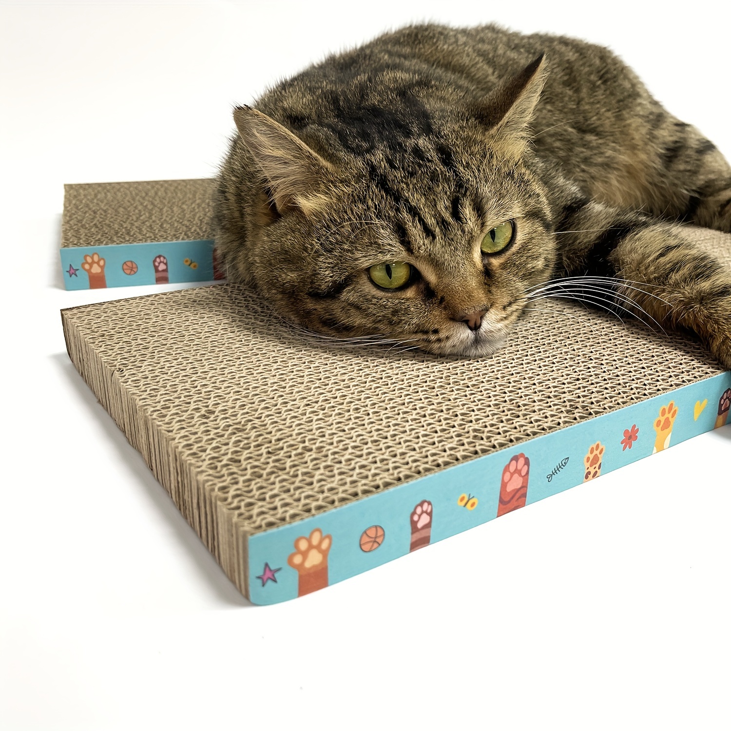 E-shop Ein wendbares Katzenkratzbrett aus Karton, entwickelt für Katzen und Kätzchen im Innenbereich, um Ihr zu schützen