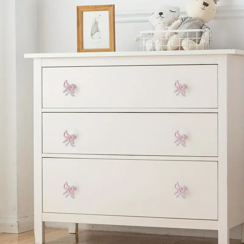 white dresser with pink knobs Pink Glitter Resin Knobs DIY