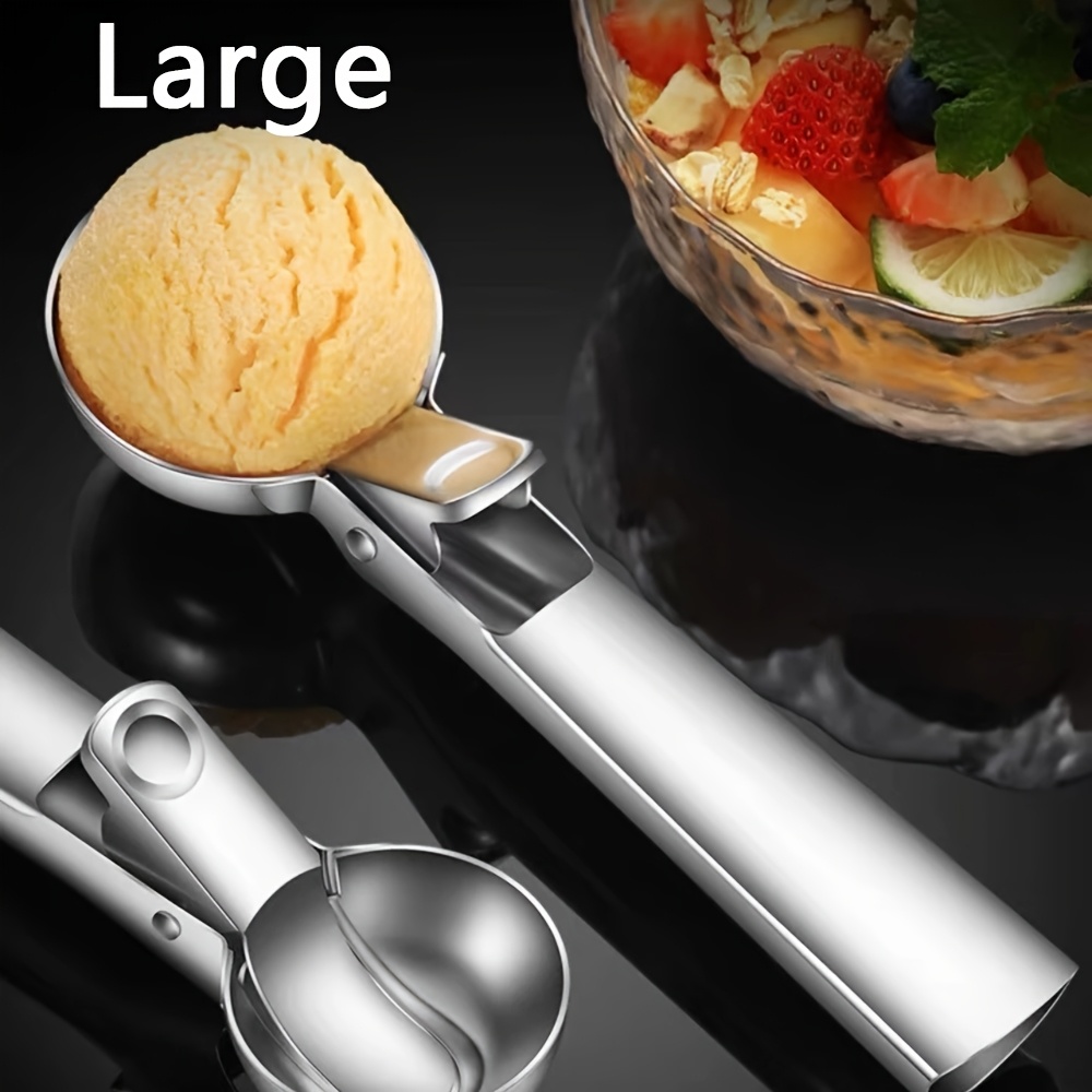 a stainless steel ice cream and   a durable spherical digger suitable for watermelon   and papaya   ice cream and  