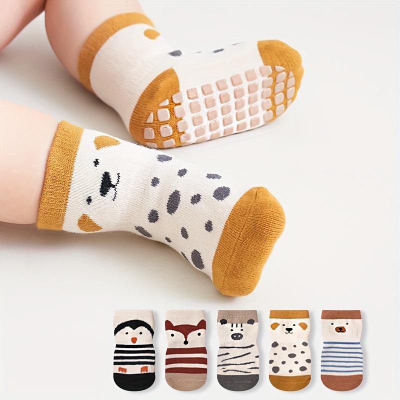 5 pairs of cartoon floor socks for infants and toddlers designed for spring and autumn featuring non slip dots for indoor use and suitable for babies learning to walk