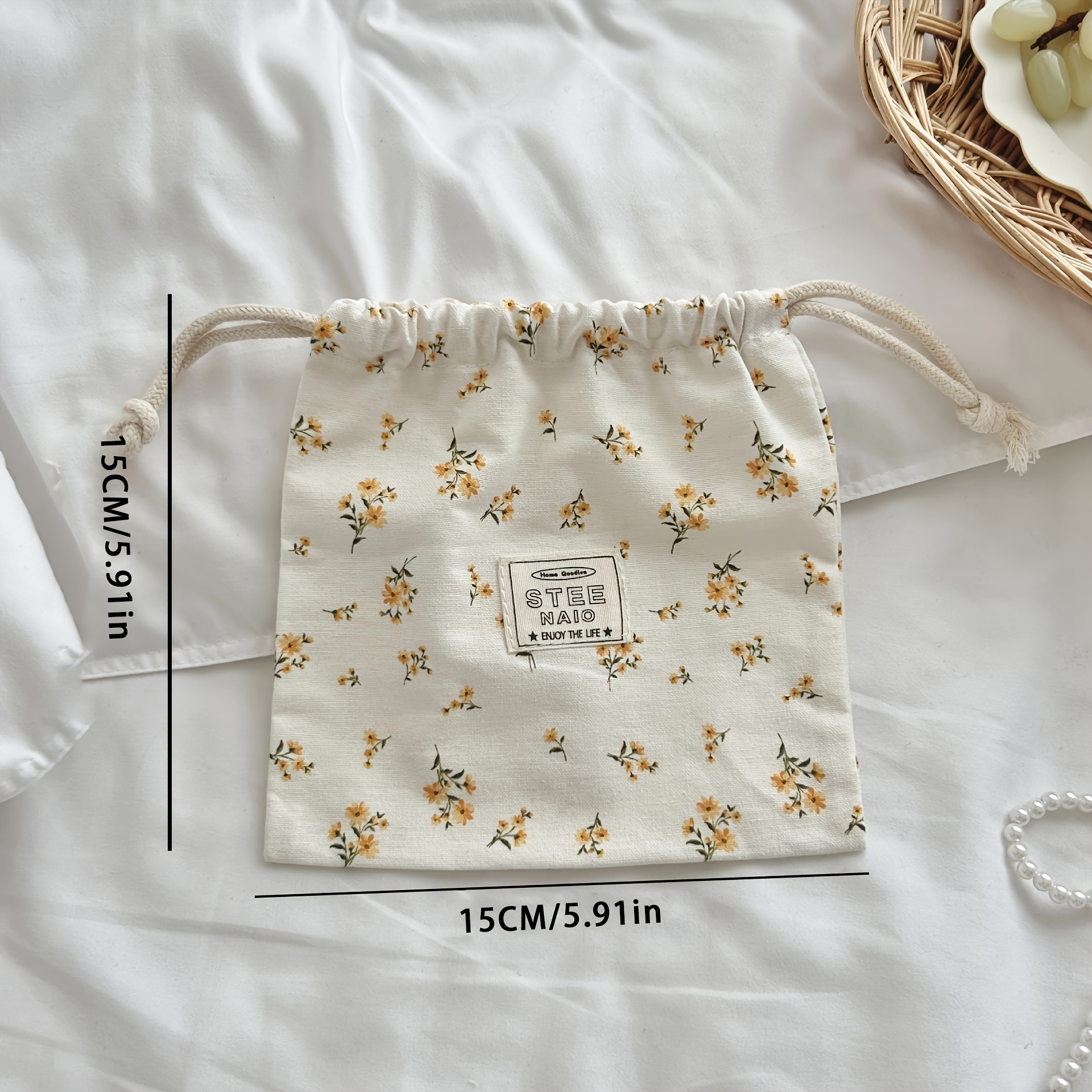E-shop Aufbewahrungstasche mit Kordelzug und Blumenmuster - ein Schmuck- und Accessoire-Organizer in verschiedenen Farben, ein unverzichtbarer