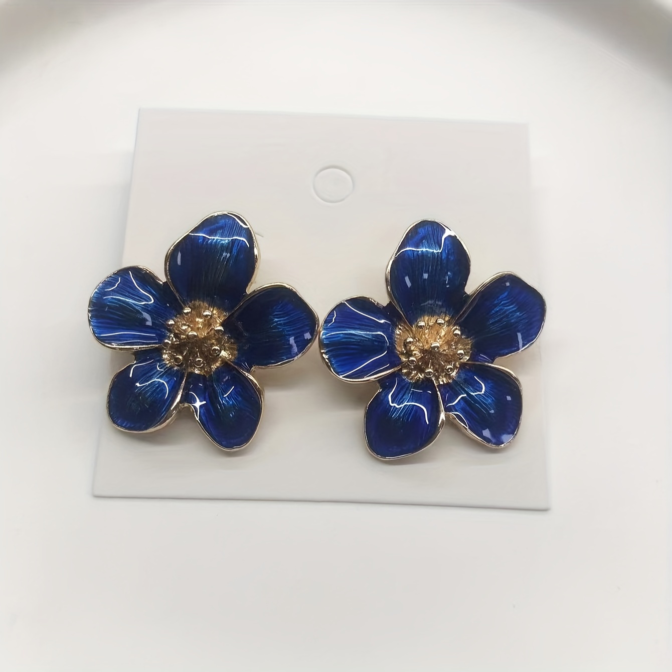 A Pair Of Fashionable Enamel Flower Earrings