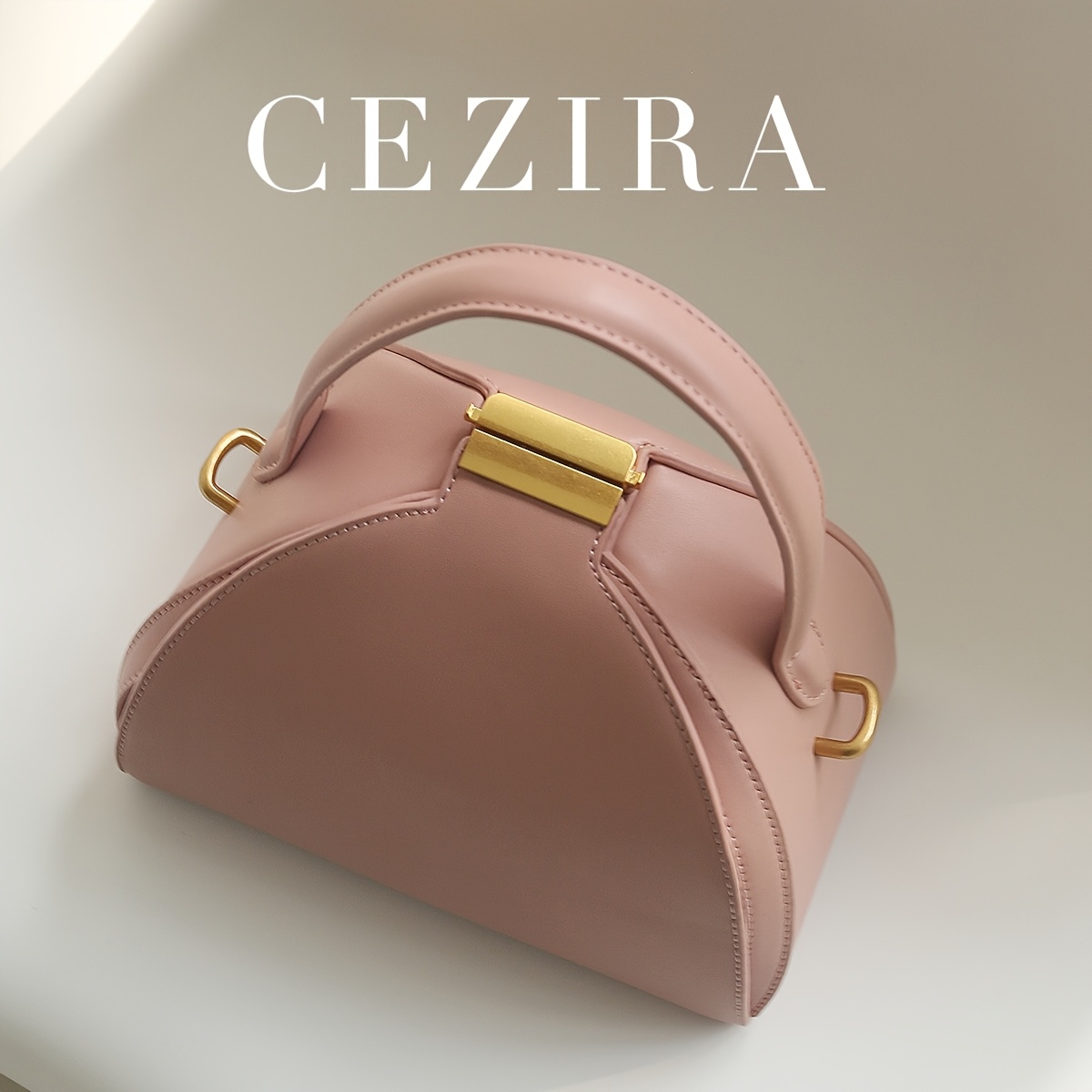 CEZIRA Women's Minimalist Elegant PU Vegan Crossbody Bag with Adjustable Long Strap & Top Handle, Squeeze Lock Closure, Box Shape Design - White & Pink, Versatile for Daily Commute, Work, Casual Outings, Crossbody Purse, Sleek Handbag, Travel Accessory, Modern Style, Highquality Finish, Compact Purse, Stylish Ladies