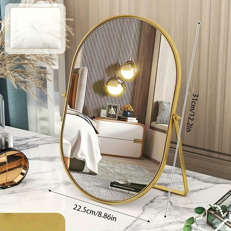 E-shop Ovaler drehbarer Schminkspiegel mit 360-Grad-Drehrahmen aus Eisen. Hochauflösender Spiegel in Gold, Silber Schwarz. Moderner Stil. Perfekte