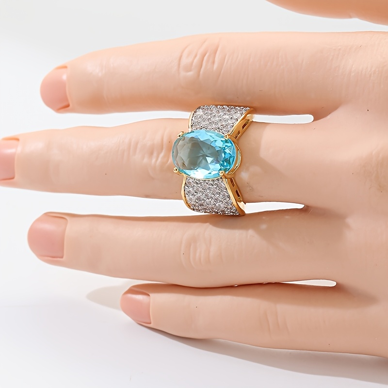 Luxurious Droplet-Shaped Blue and White Synthetic Zirconia Ring