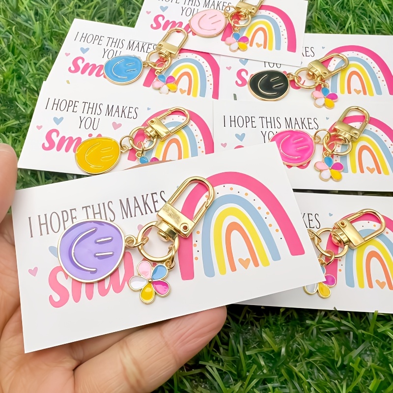 item picture 21pcs 7 set happy   face keychains colorful cartoon metal key accessories with cards   7 keychains 7 cards 7 gift bags keychains suitable for wallets and handbags durable metal construction wallet charms event party gifts