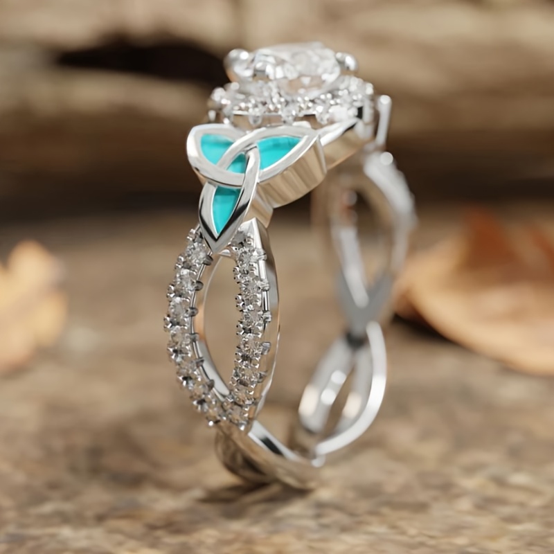 Women's Zirconia Infinity Anniversary Ring with Enamel Leaf Celtic Knot