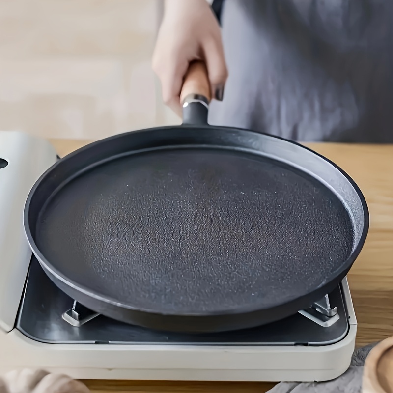 1pc   thick cast iron non stick frying pan with wooden handle   omelets pancakes   steak frying pan essential kitchen cookware for effortless cooking 0