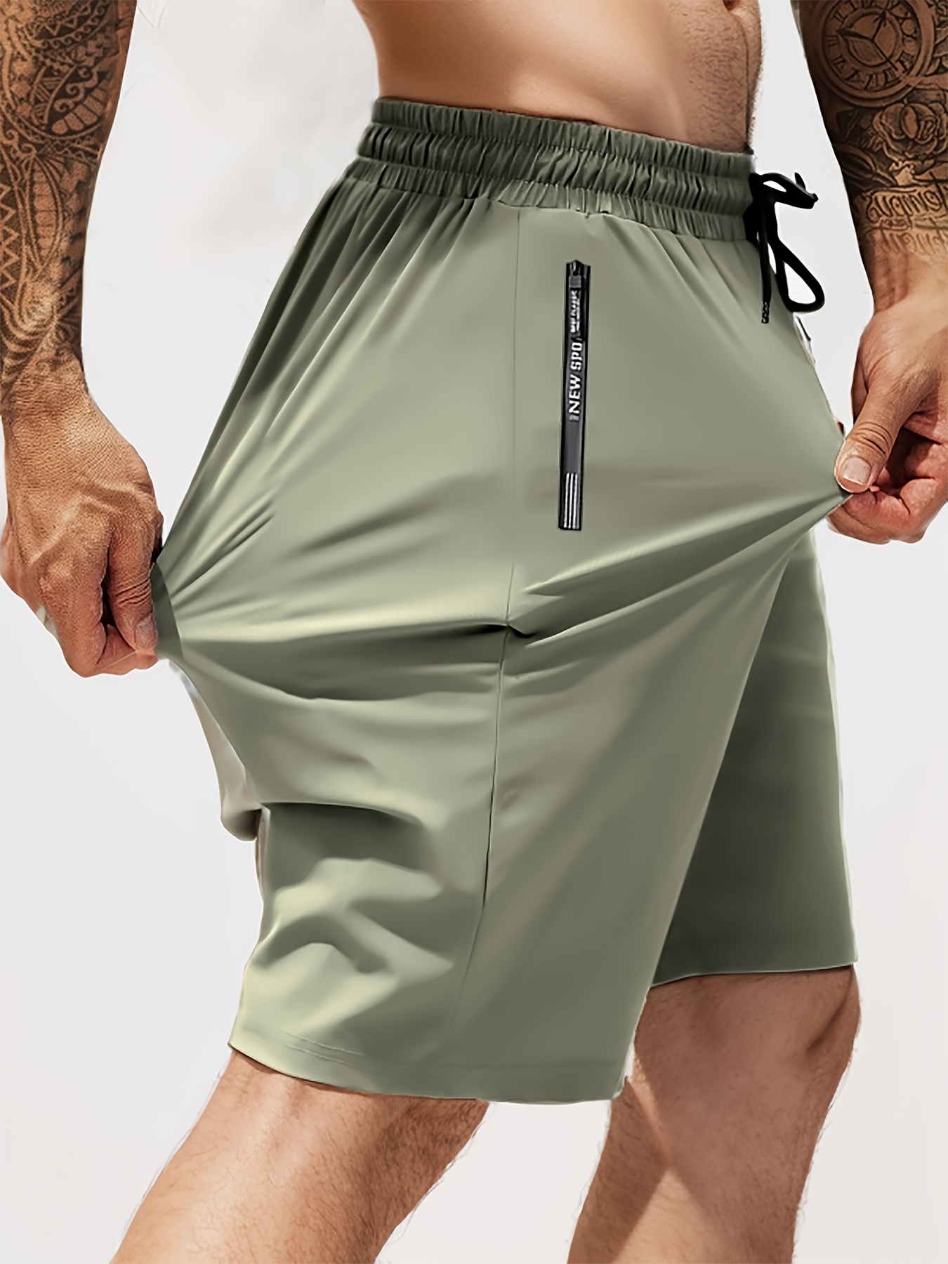 mens stretchy and breathable fabric shorts with a waist and zip pockets suitable for   jogging and casual wear cool and breathable   and basketball training shorts for spring summer and autumn