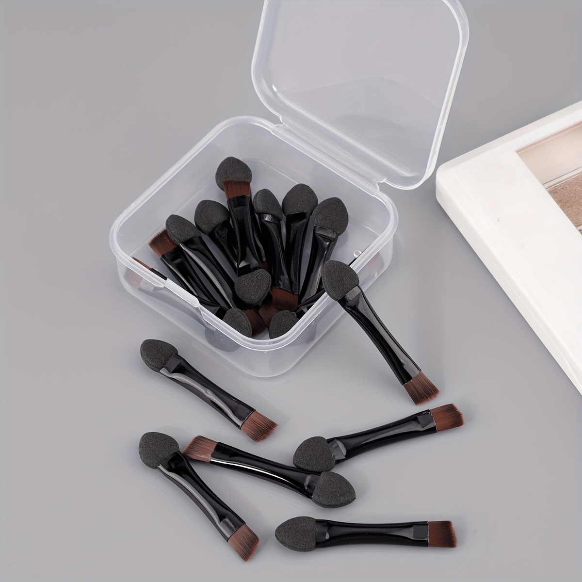 A Set Of 10 Dual-ended -one Eyeshadow Brushes With A Compact Case, Featuring Angled And Flat Brushes For Eyebrows And Eyeliner