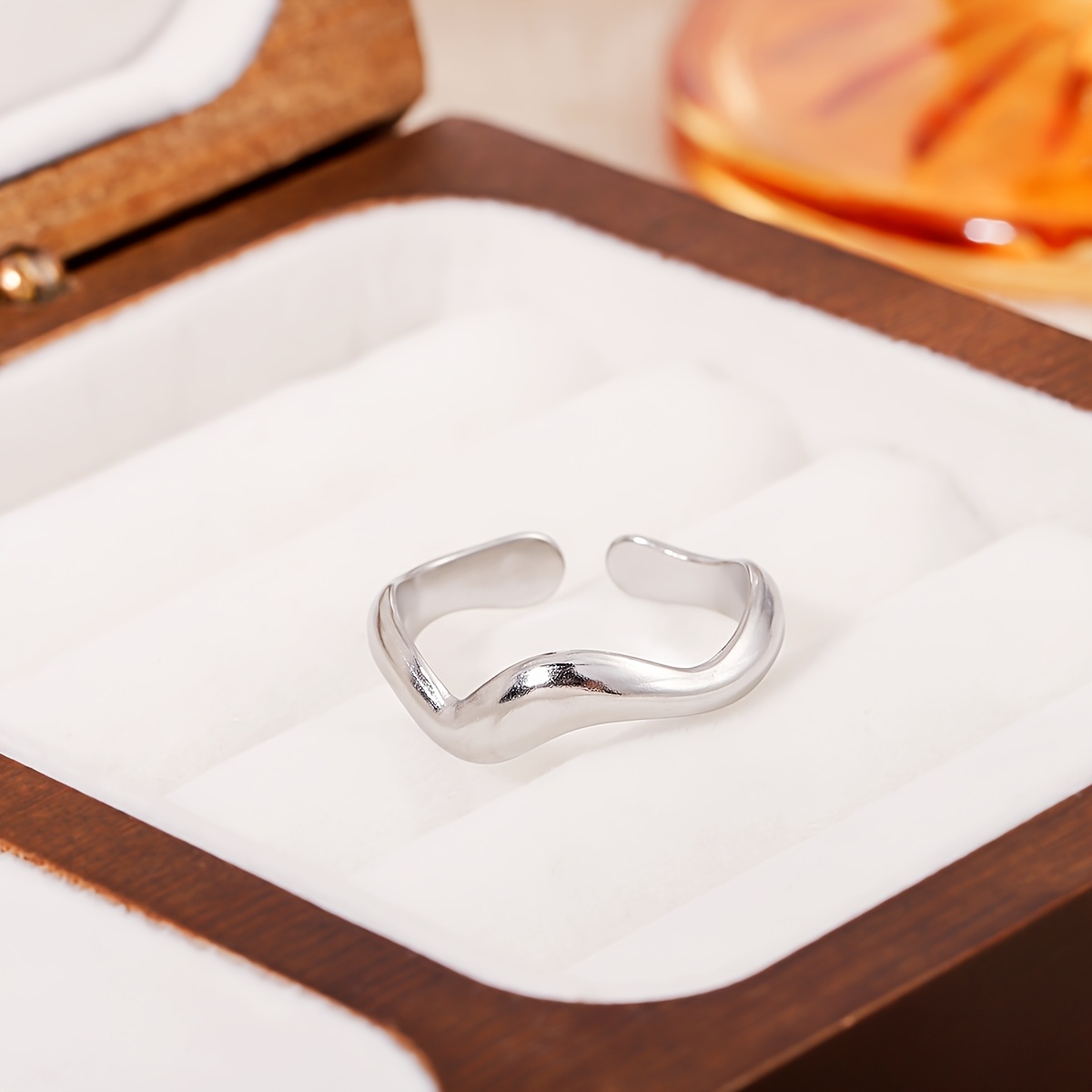 A Minimalist Wave-inspired Stainless Steel . Material, Won't Tarnish. Ideal For Casual Attire And Versatile Fashion Accessorizing.