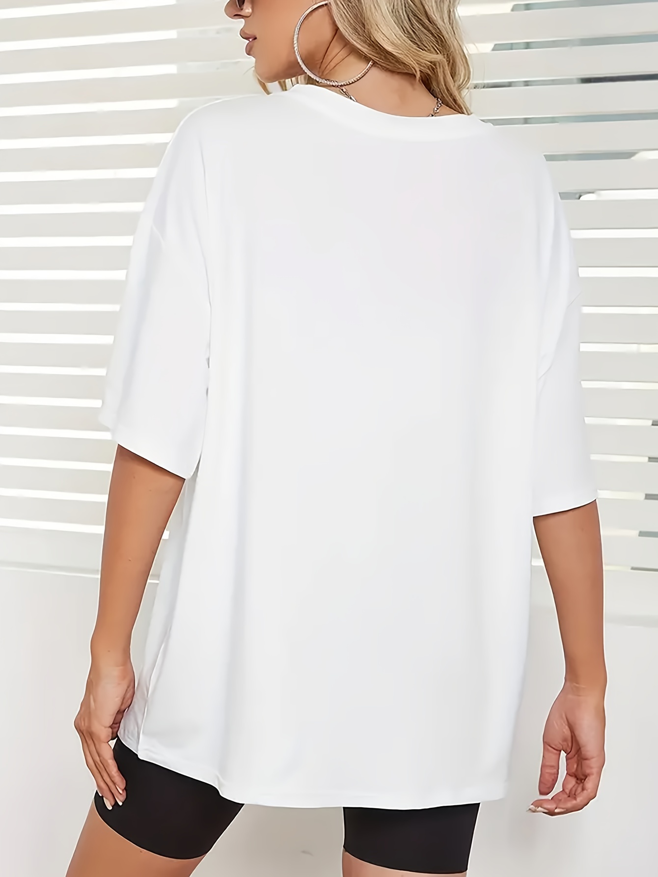 womens oversized white casual t shirt with black heart print soft   stretch fabric   shoulder relaxed fit round neck short sleeve everyday   for   wear  able outfit lightweight tee durable fabric loose fit shirt trendy clothing streetwear style Product details 1